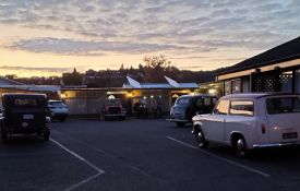 In carpark bikes and old cars